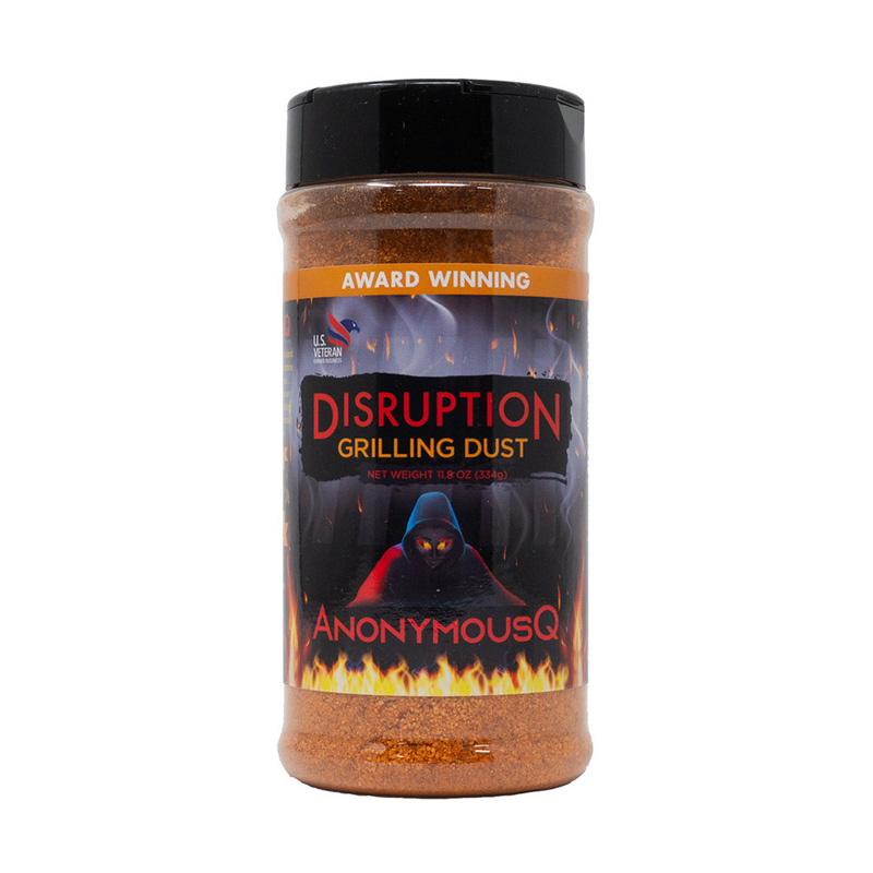 AnonymousQ Disruption Grilling Dust beside grilled chicken and vegetables