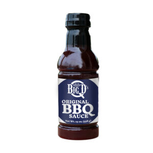 Big D’s Original BBQ Sauce beside glazed ribs