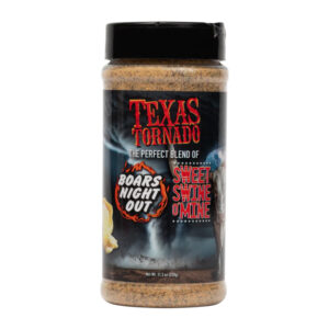 Bottle of Boar’s Night Out Sweet Swine O’ Mine Texas Tornado beside smoked ribs and brisket