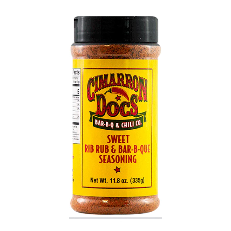 Bottle of Cimarron Doc’s Sweet Rib Rub & BBQ Seasoning beside glazed ribs