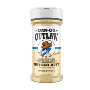 Bottle of Dan-O’s Butter Dust with popcorn and corn.