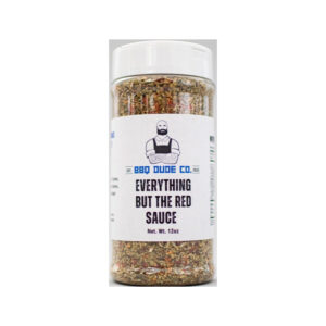 BBQ Dude Everything But the Red Sauce Italian Seasoning bottle beside pasta and olive oil.