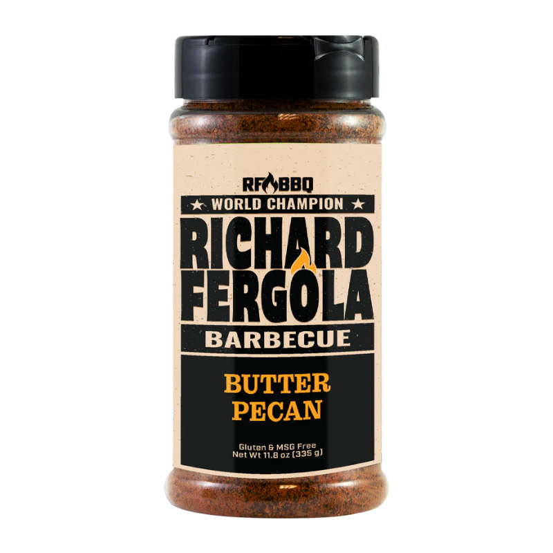 Bottle of Richard Fergola BBQ Butter Pecan Rub beside glazed ribs and chicken