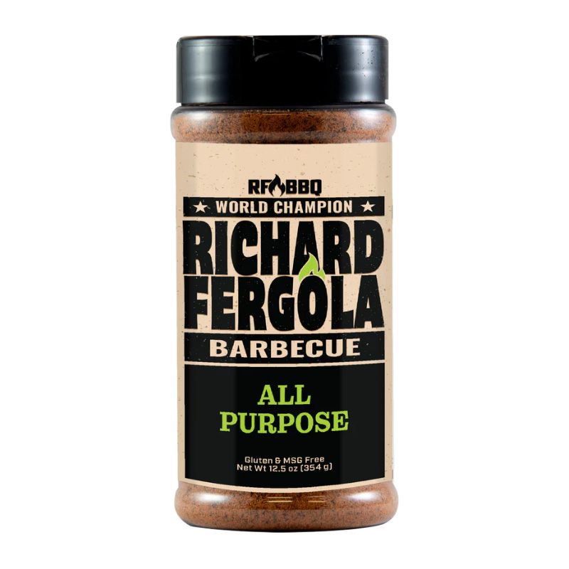 Bottle of Richard Fergola Barbecue All Purpose Rub beside grilled steak and chicken