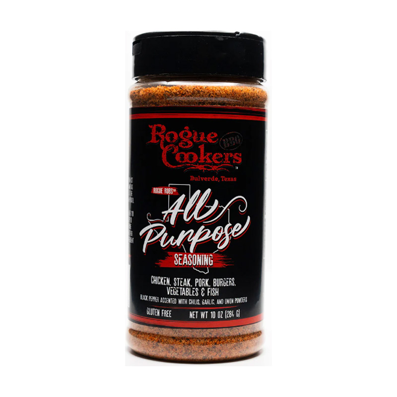 Bottle of Rogue Cookers All Purpose Rub beside grilled chicken and steak