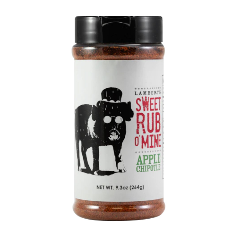 Bottle of Sweet Rub O’ Mine Apple Chipotle Rub beside glazed ribs and chicken