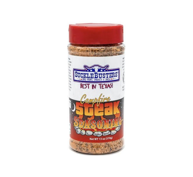 Jar of SuckleBusters Campfire Steak Seasoning with visible cracked pepper and garlic granules