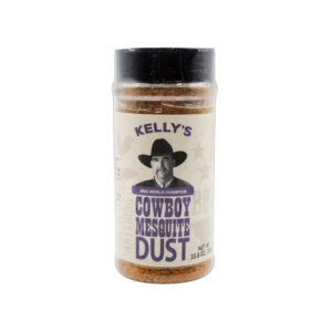 Bottle of Cowboy Mesquite Dust seasoning with grilled steak