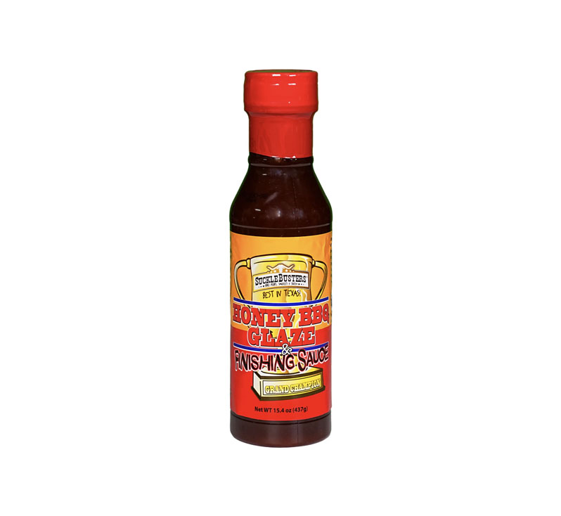 SuckleBusters Honey BBQ Glaze 15.4 oz bottle on wooden board