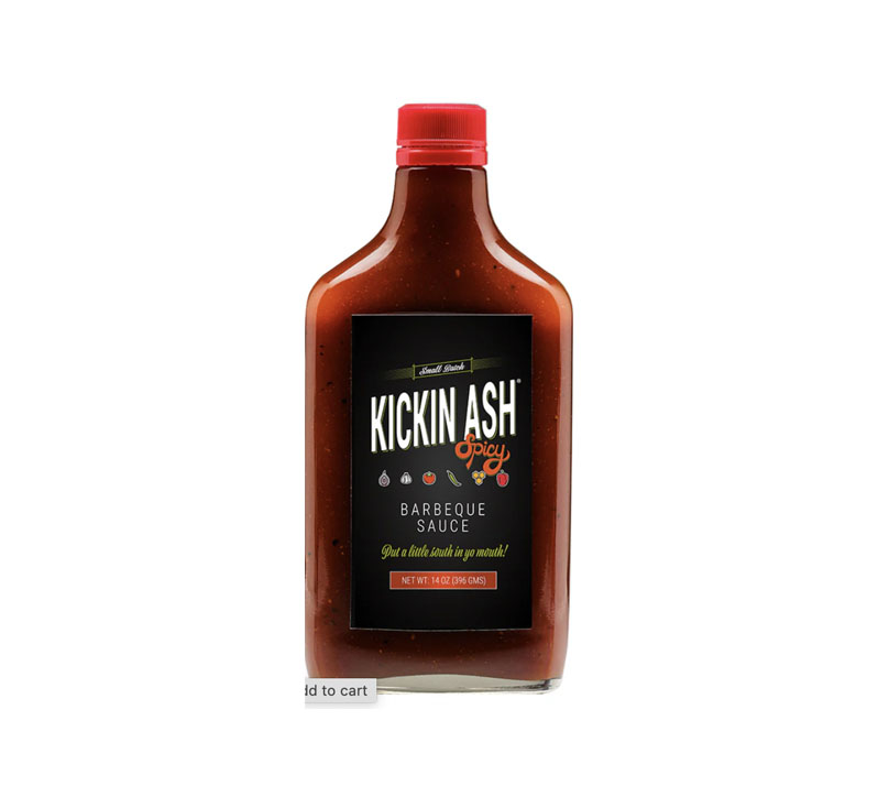 “Kickin Ash Spicy Barbecue Sauce bottle with bold spicy BBQ label”