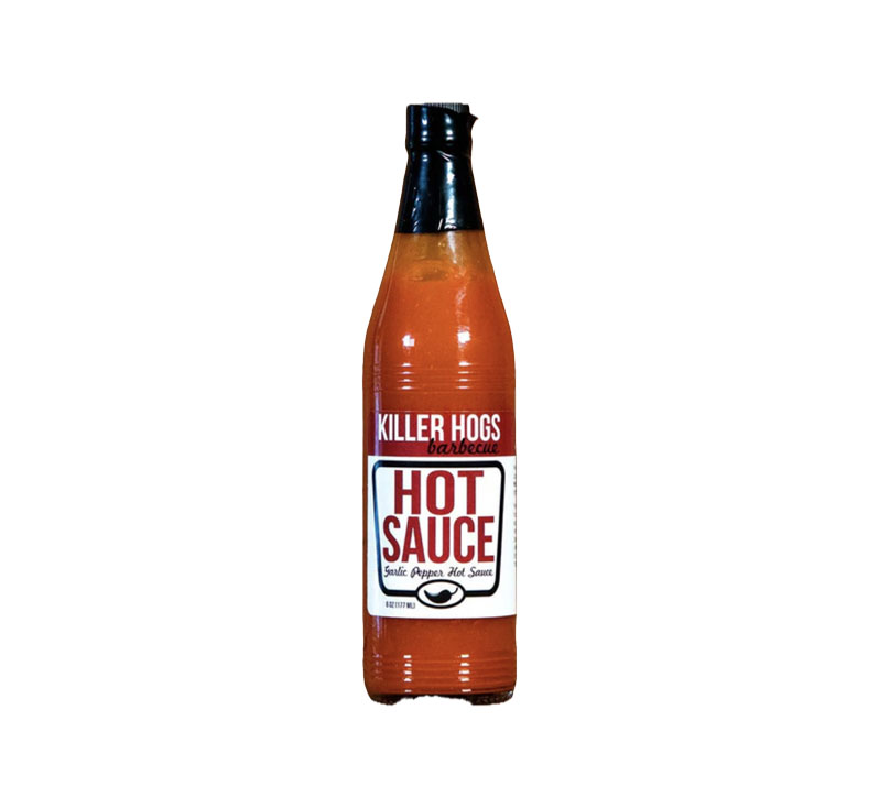 “Killer Hogs Hot Sauce bottle front label – aged red pepper mash & vinegar”