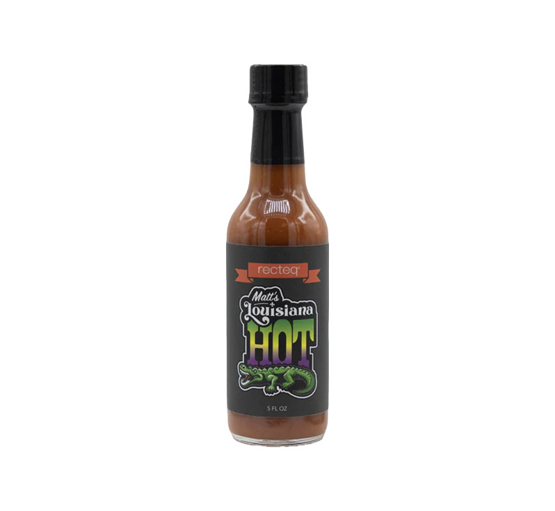 Bottle of Matt’s Louisiana Hot Sauce featuring bright cayenne pepper blend.