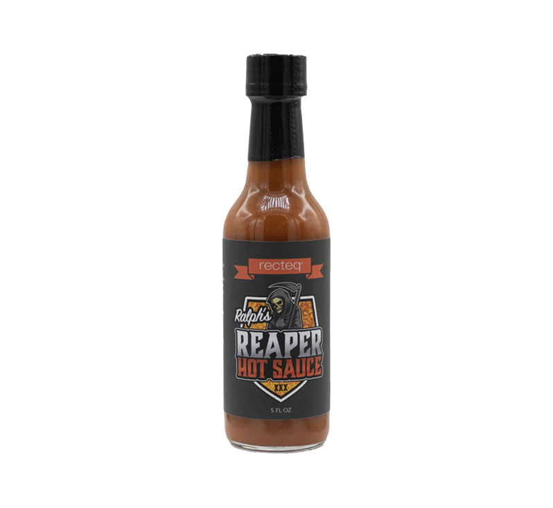 Bottle of Ralph’s Reaper Sauce featuring Carolina Reaper hot sauce with bold, fiery character.