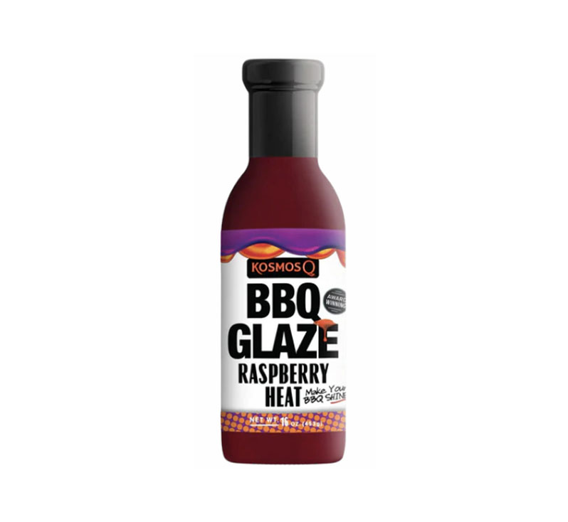 “Bottle of Raspberry Heat BBQ Glaze with glossy sweet-heat finish”