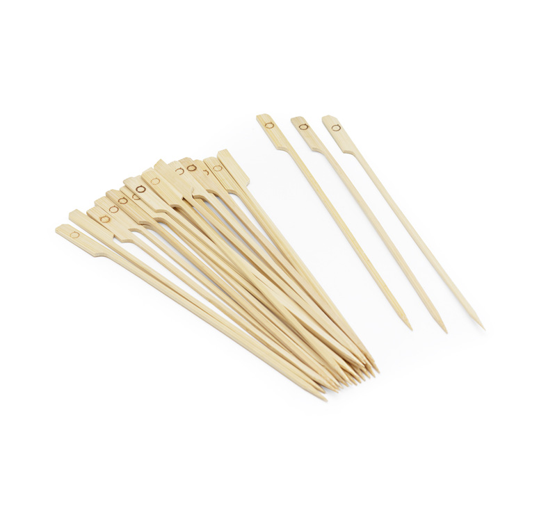Loose bamboo paddle skewers on white background