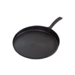 Cast iron skillet griddle on white background