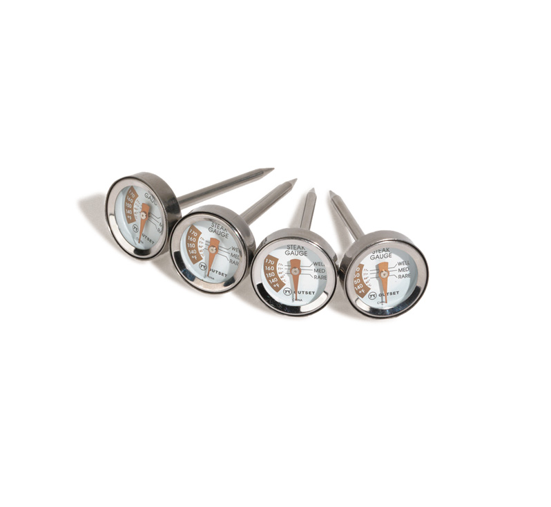 Four stainless steel mini steak thermometers arranged